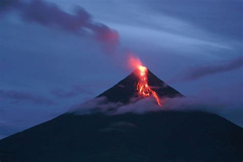 Philippines' most active volcano spews lava, thousands flee | CTV News