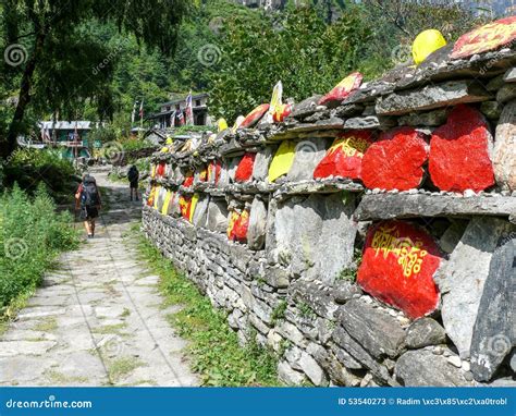 Mani wall in Thoche, Nepal editorial stock photo. Image of meet - 53540273