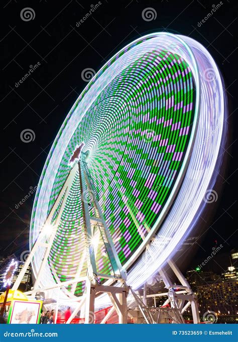 Ferris wheel at night stock image. Image of fairground - 73523659