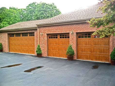 Clopay Gallery in Ultragrain (color -medium) What a great way to add curb appeal, notice how t ...