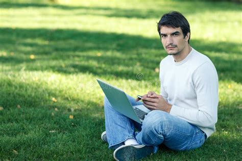 Man with laptop outdoors stock image. Image of outdoors - 26707587