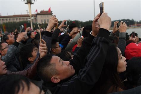 Does taking photos during flag-raising ceremony break China’s new ...