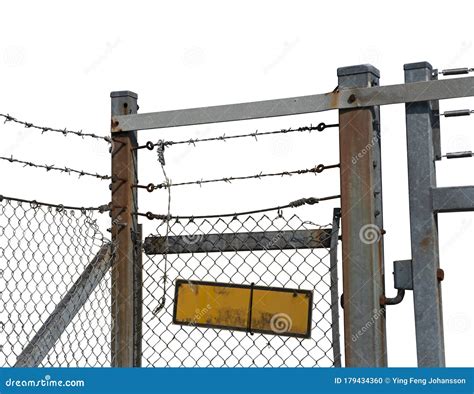 Rusty Chain Link Fence with Barbed Wire and Yellow Dirty Sign Stock ...