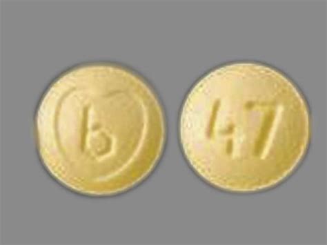 B 47 Pill Images (Yellow / Round)