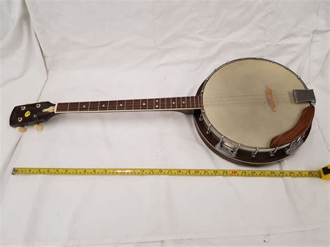 4 STRING BANJO - Schmalz Auctions