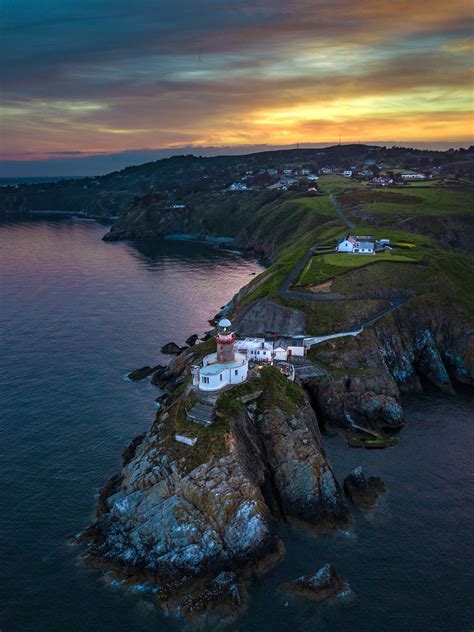 Sunset over Baily Lighthouse in Howth, Dublin - Sunset over Baily Lighthouse in Howth, Dublin ...