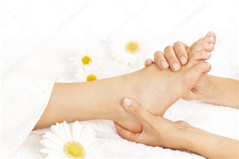 Foot massage Stock Photo by ©elenathewise 7611901