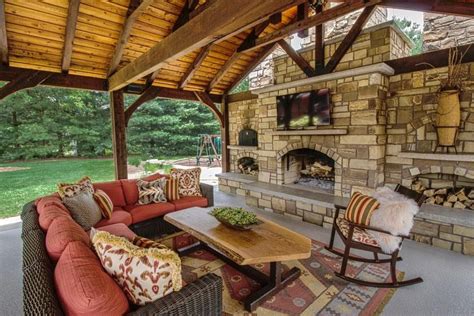 Cozy Up by the Outdoor Fireplace and Watch TV | Outdoor fireplace ...