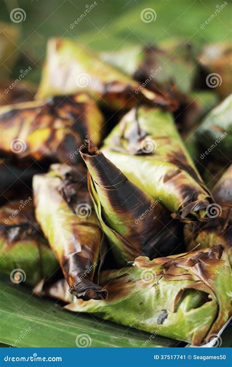 Sticky Rice Wrapped in Banana Leaves Grill Stock Image - Image of ...