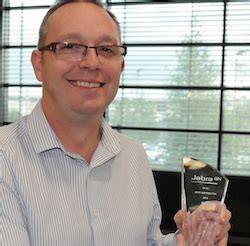 Comms Dealer - Nimans collects Jabra's Distributor of the Year award