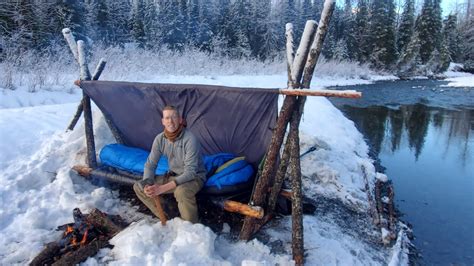 HOT ROCKS in my Bushcraft Cot – Winter Camping in Alaska with a Survival Shelter – Survival Enquirer