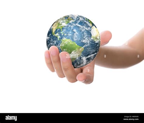 Hands with earth (Elements of this image furnished by NASA Stock Photo ...