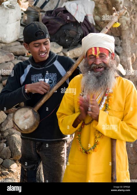 Jan 10, 2006 - Orcha, Madhya Pradesh, India - Traditional dress contrast with western dress both ...