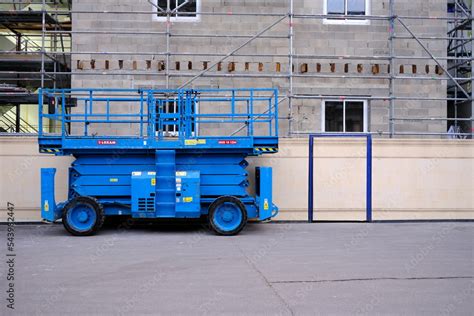 PARIS, FRANCE - AUGUST 28, 2022: Electric Scissor Lift of Loxam. Loxam. The Loxam Group has ...