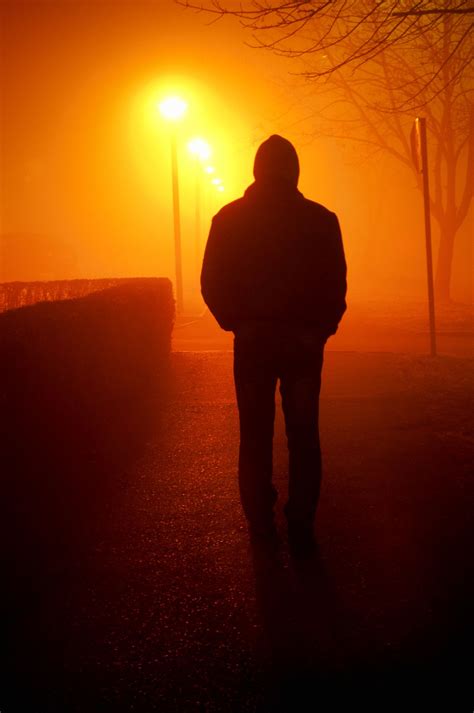 Silhouette of a young man, foggy night | Silhouette photography, Night ...