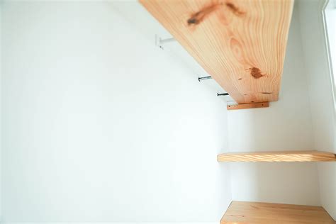 DIY Floating Wood Shelves + Clothing Bar - In Honor Of Design