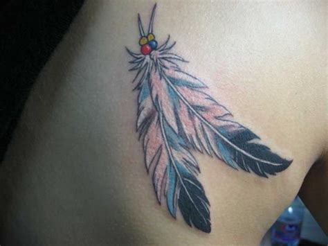 feather tattoos | indian feather tattoos. Native american feather tattoo | Feather tattoo design ...