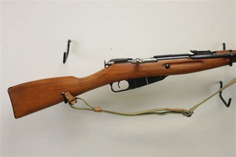 MOSIN NAGANT , MODEL: POLISH M44 , CALIBER: 7.62 X 54R - Switzer's Auction & Appraisal Service