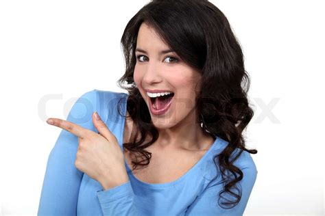 Woman pointing and laughing | Stock image | Colourbox