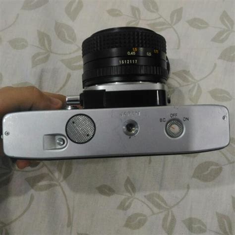 MINOLTA SRT 101, Photography, Cameras on Carousell