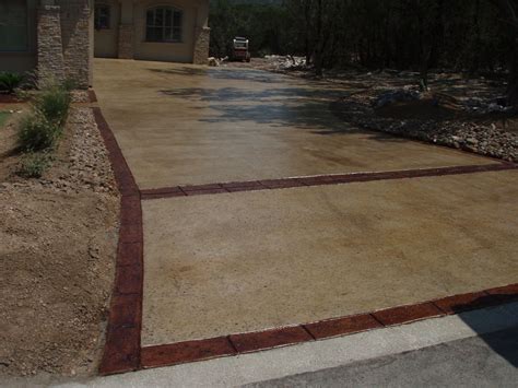 stained concrete - two tone in garage like wood inlay contrast | Stained concrete driveway ...