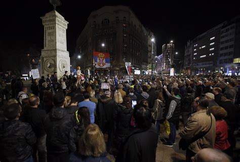 Serbia anti-government protesters surround state TV building