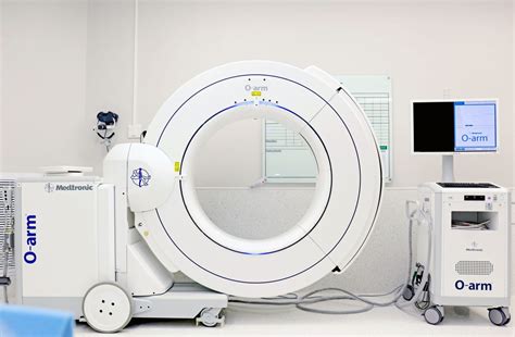 The Medtronic O-Arm 2, a surgical imaging system, and StealthStationTM ...