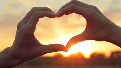 Female Hands Showing Heart Shape Framing Setting Sun Sunset. Love Sign, Valentines Day Concept ...