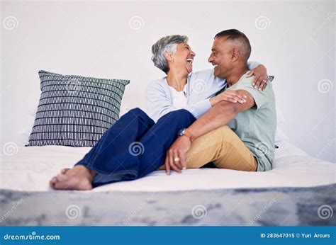 Hug, Bedroom and Laughing Senior Couple Bonding, Talking and Enjoy ...