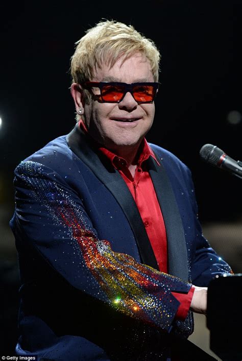 David Furnish hosts London party while Sir Elton John performs in ...