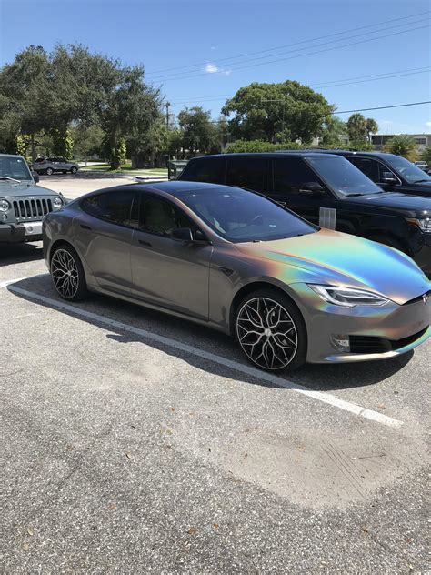 Saw a Tesla the other day with a color changing paint job : r/Elon ...