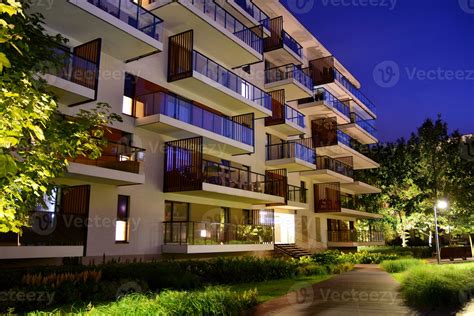 Exterior of apartment building at night 27852690 Stock Photo at Vecteezy