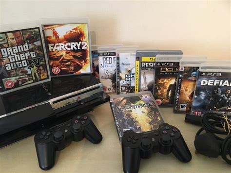 Sony PS3 60GB Console + 2 Official SONY Wireless Controllers + 10 Games ...