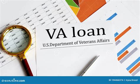 Paper with VA Loan on a Table with Charts, Pen and Magnifier Stock ...