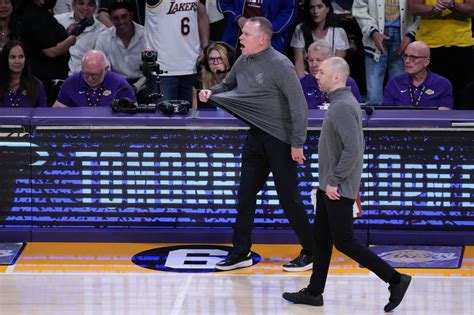 Denver Nuggets head coach Michael Malone yells down the court during ...