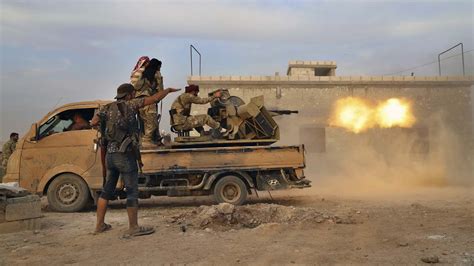 Turkish forces battle Kurdish fighters to gain control over key town in northeastern Syria; US ...