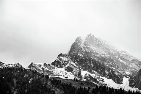 Black and White Snowy Mountain Photograph by Artpics - Pixels