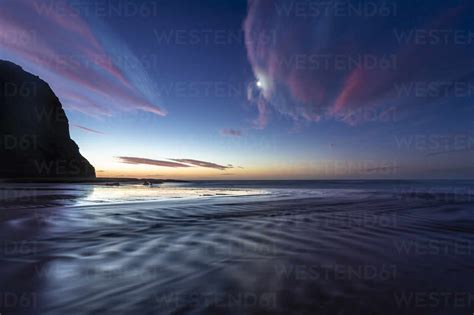 New Zealand, South Island, Ocean at sunset stock photo