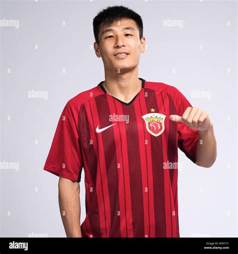 Chinese football player Wu Lei of Shanghai SIPG poses for portrait ...