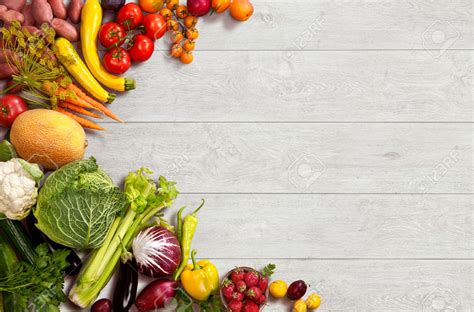 33709968-studio-photo-of-different-fruits-and-vegetables-on-wooden-table-Stock-Photo - Cardiogenix