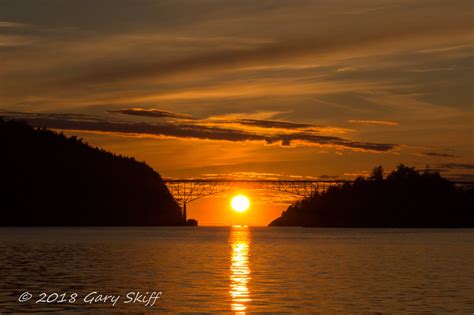 Photos: Crescent moon makes for stunning sunset at Deception Pass Bridge | KVAL