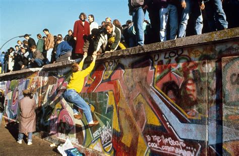 Iconic photos from the night the Berlin Wall fell 30 years ago