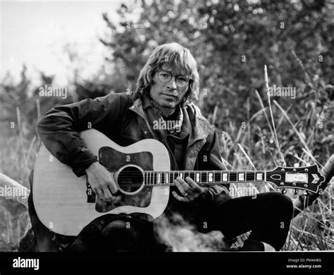 John denver 1977 Black and White Stock Photos & Images - Alamy