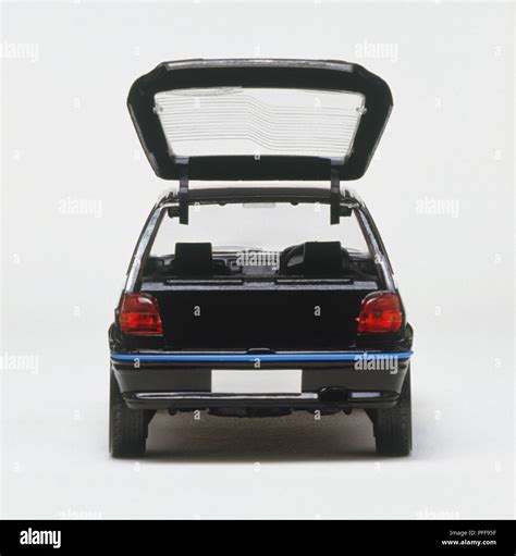 Car with its back door open, rear view Stock Photo - Alamy