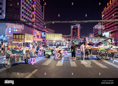 Streets of Guilin at night in China Stock Photo - Alamy