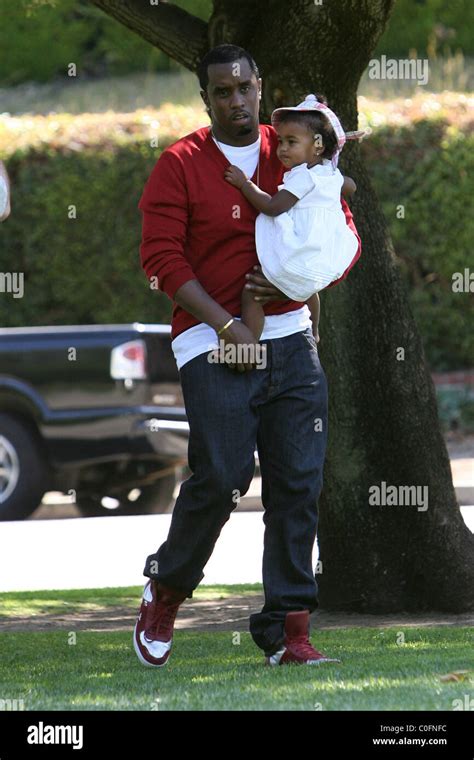 Sean 'P. Diddy' Combs plays with his twin daughters D'Lila Star Combs ...