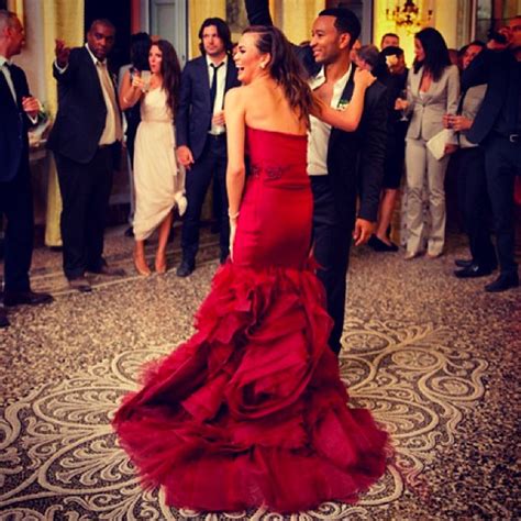 Chrissy Teigen Shows Off Red Wedding Dress | E! News