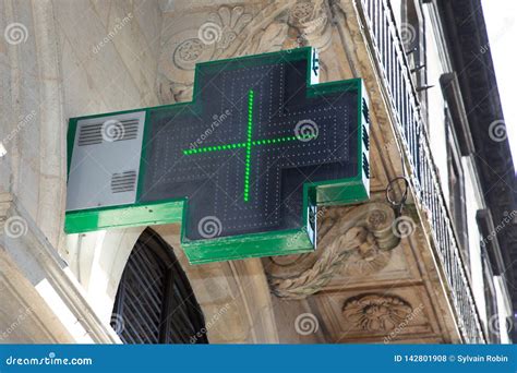 Cross Green Pharmacy Sign Outside a Pharmacy Store in France Stock Photo - Image of medicine ...