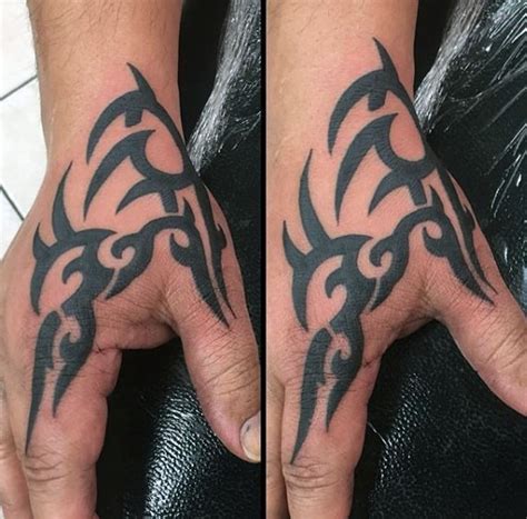 40 Tribal Hand Tattoos For Men - Manly Ink Design Ideas