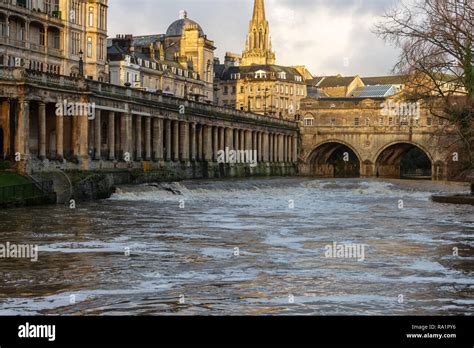 Winter mornings view across the River Avon in flood encompassing ...